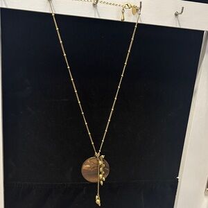 Vintage abalone and gold tone necklace by Lia Sophia. Round,